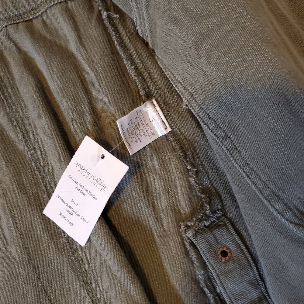 Hooded vest with tags